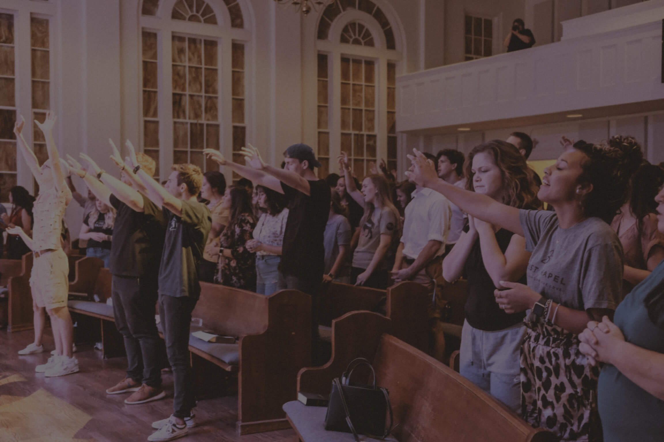 Hands raised worshipping in Africa